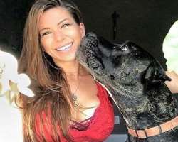 She has a big dog in her home.